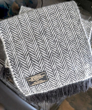 Close up of Handwoven alpaca black and white herringbone