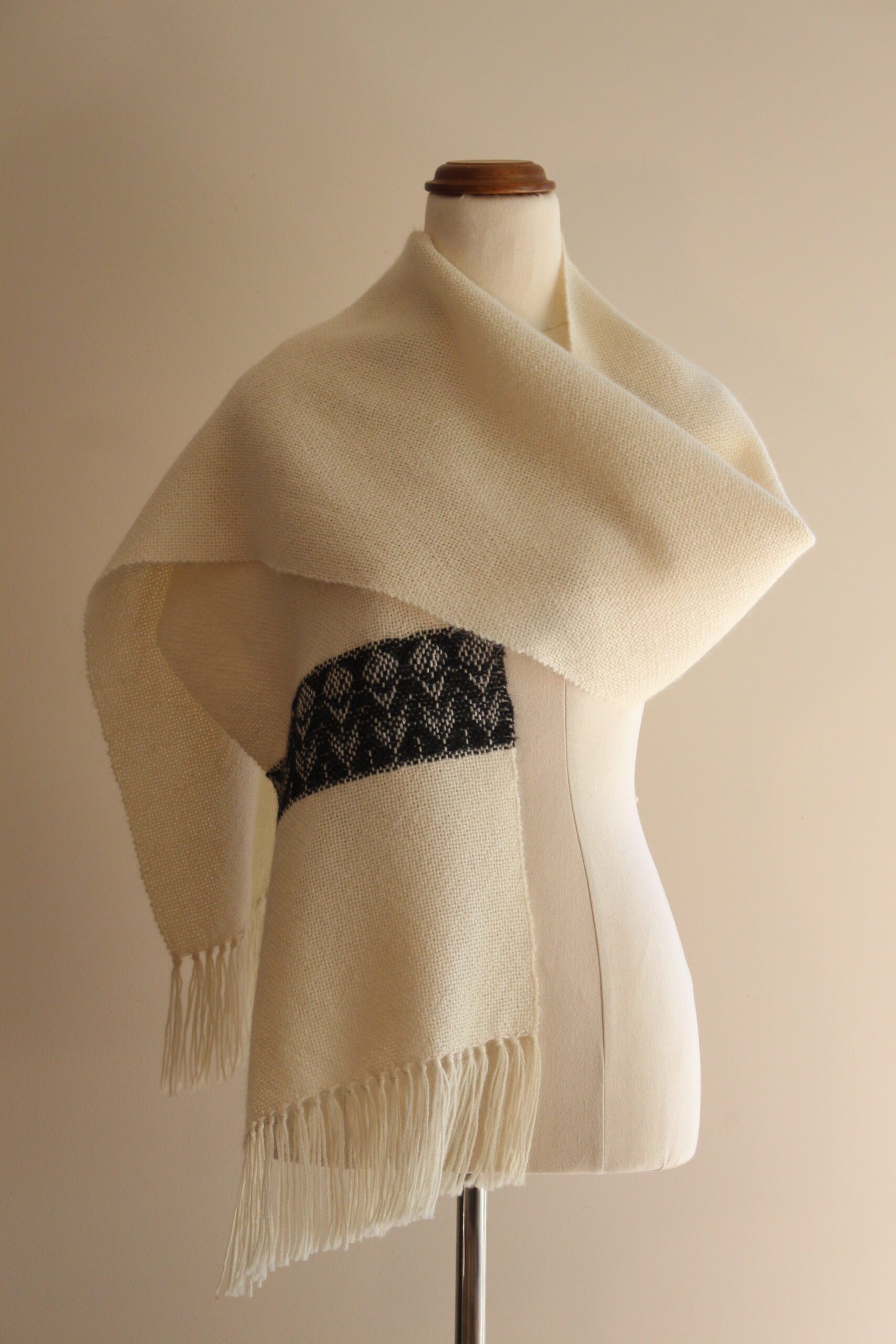 handwoven alpaca scarf Australia white and black waratah motif